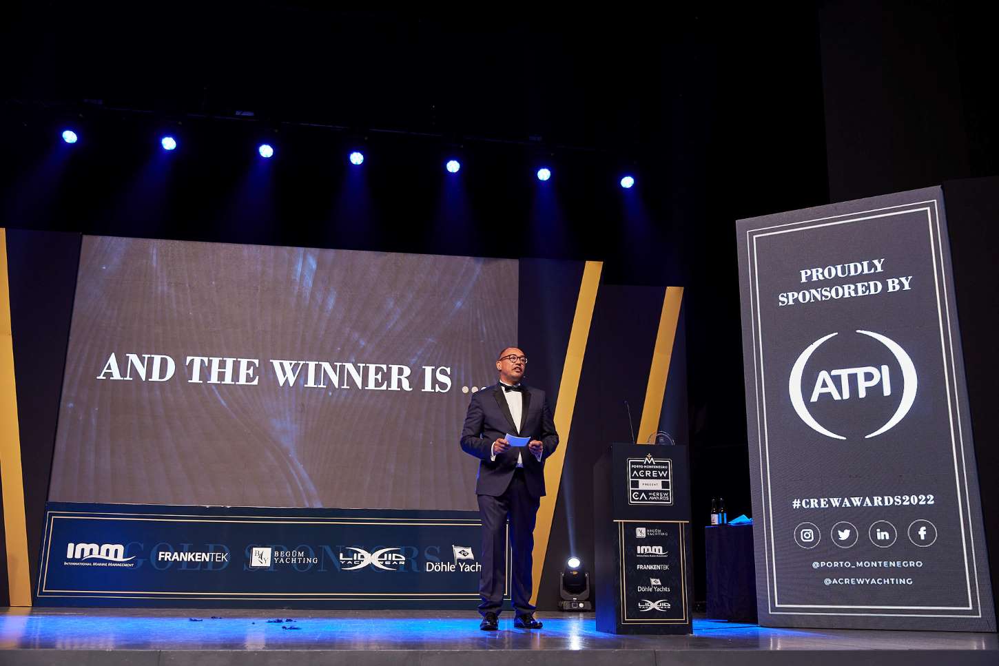 Man in the suite on the stage